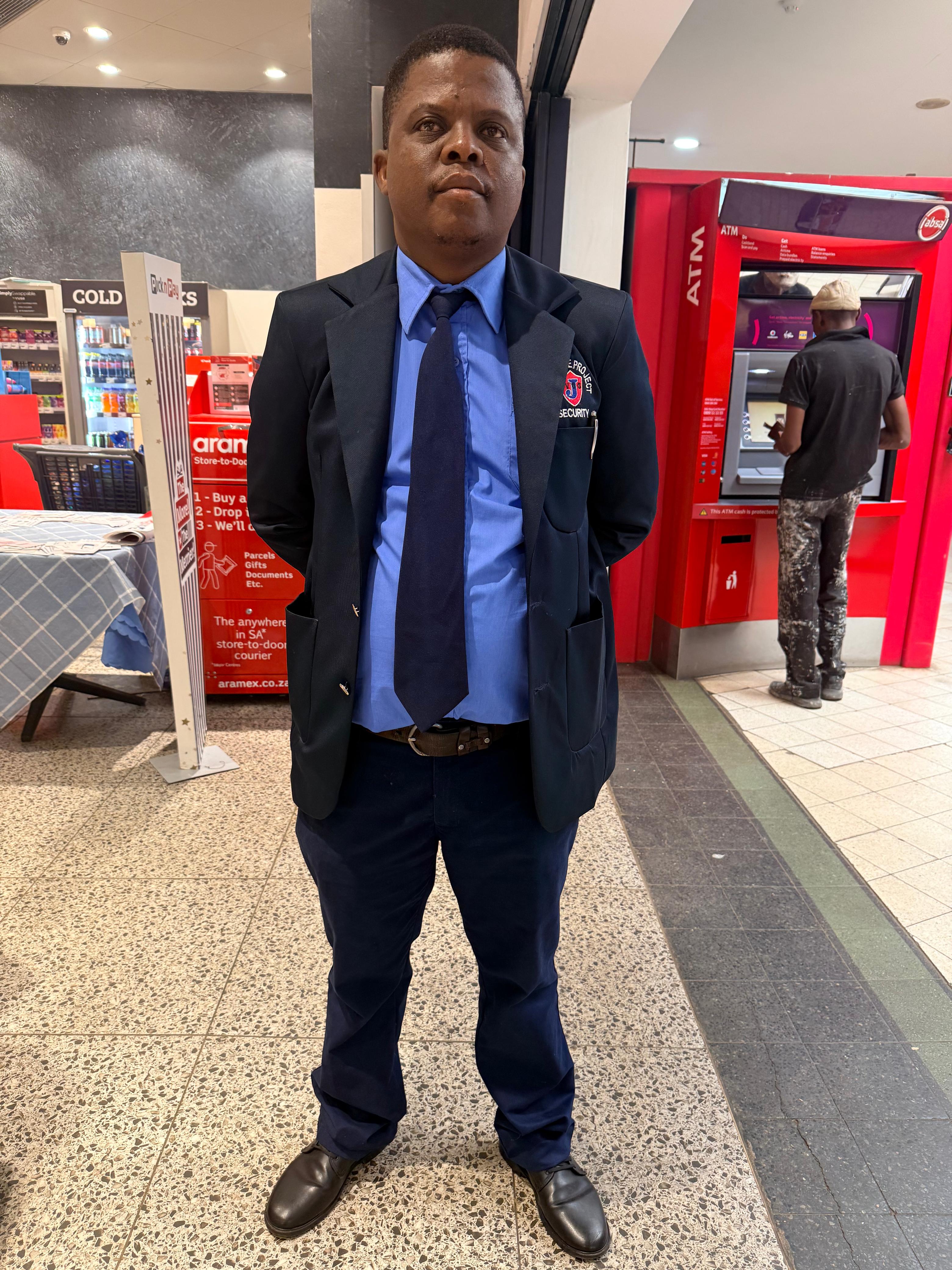 Security officer providing retail security